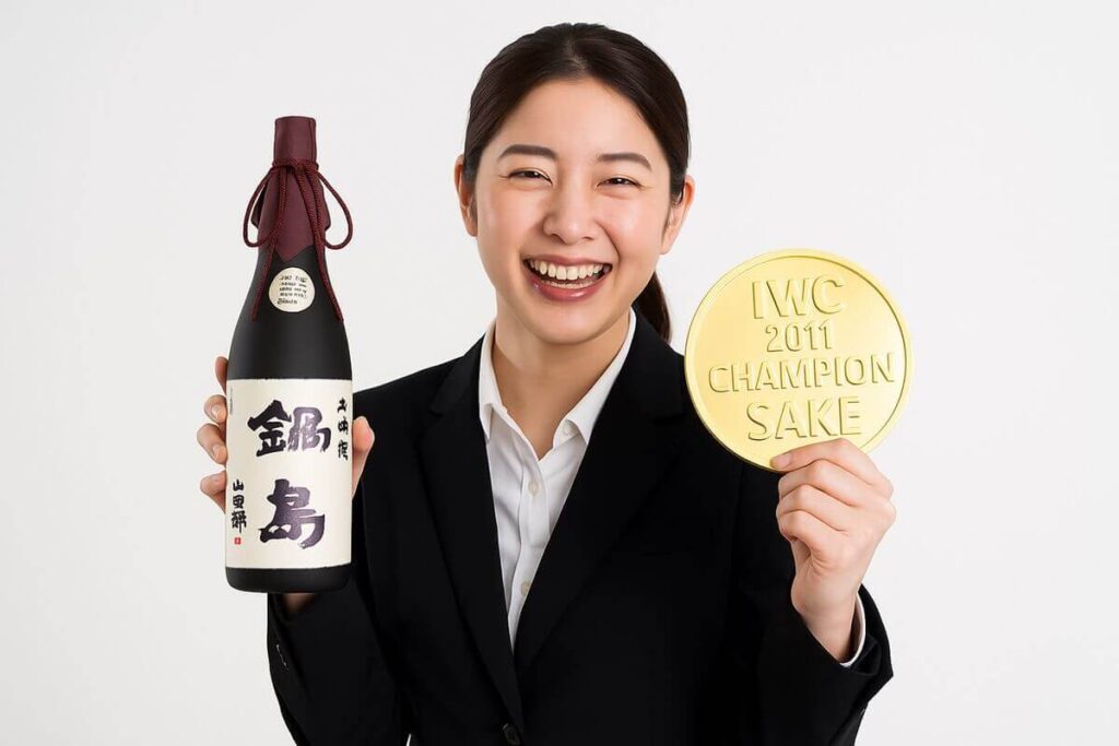 鍋島の受賞を喜ぶ女性